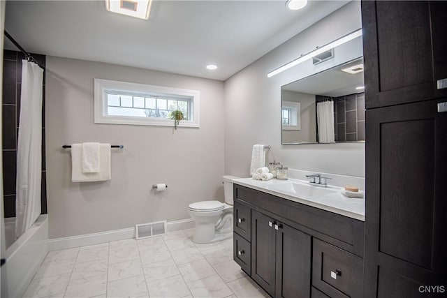 bathroom featuring baseboards, visible vents, toilet, and marble finish floor
