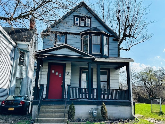 traditional style home featuring a porch