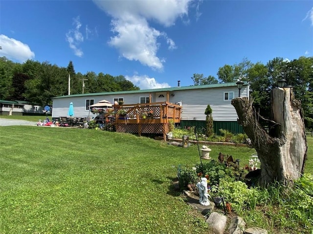 846-848 Silas Tompkins Rd, Hancock, NY 12760 - back of house featuring a deck and a lawn