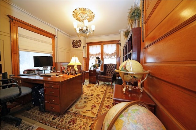 office space featuring ornamental molding and a chandelier