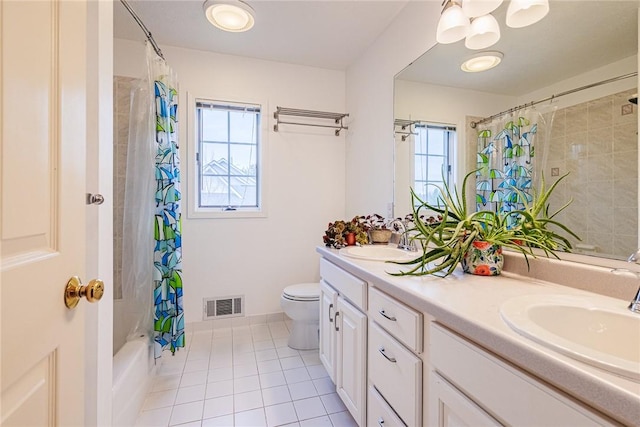 full bath featuring visible vents, plenty of natural light, a sink, and tile patterned flooring