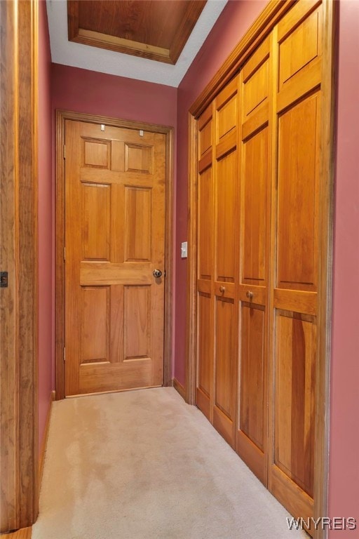 hall with carpet floors