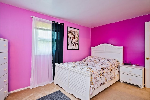 bedroom featuring carpet