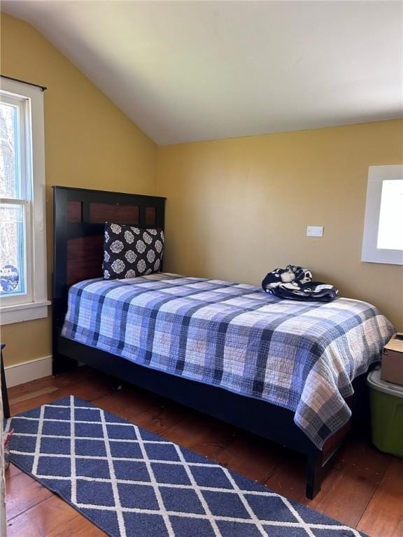 1365 Copes Corner Rd, Butternuts, NY 13843 - bedroom featuring lofted ceiling, wood finished floors, and baseboards