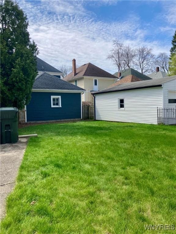 view of yard with fence