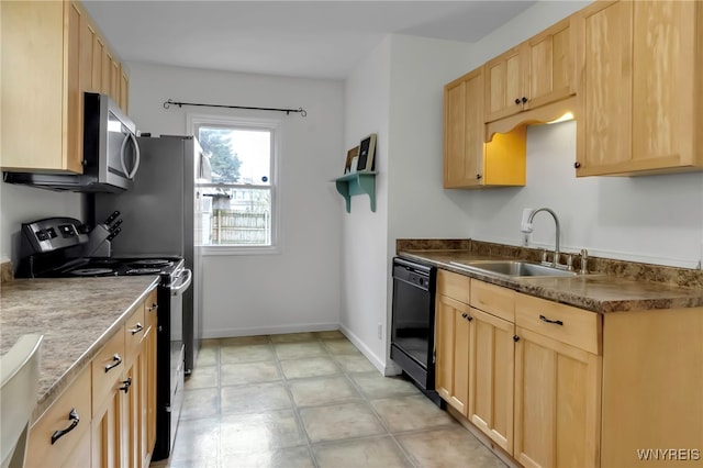 kitchen featuring light brown cabinets, black appliances, dark countertops, a sink, and baseboards