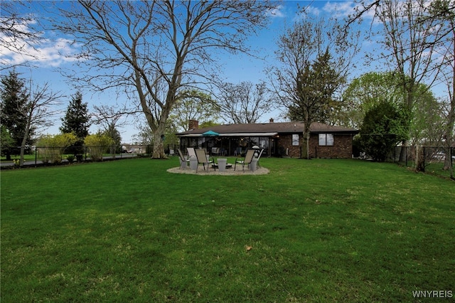 view of yard with a fenced backyard and a patio area