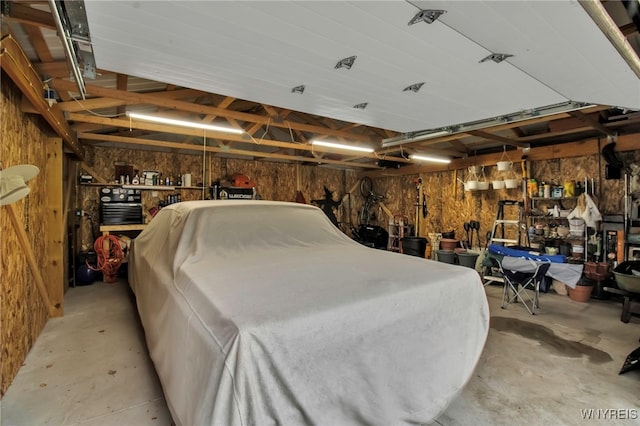 garage with wood walls