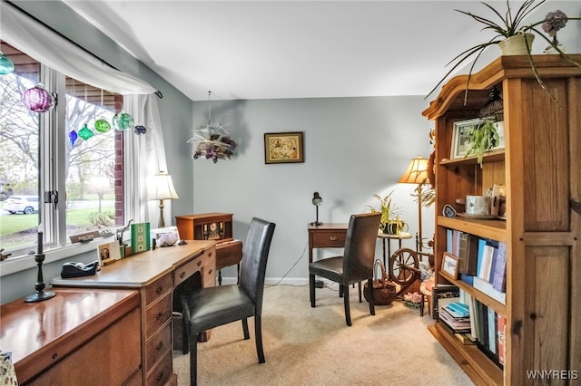 home office featuring light carpet