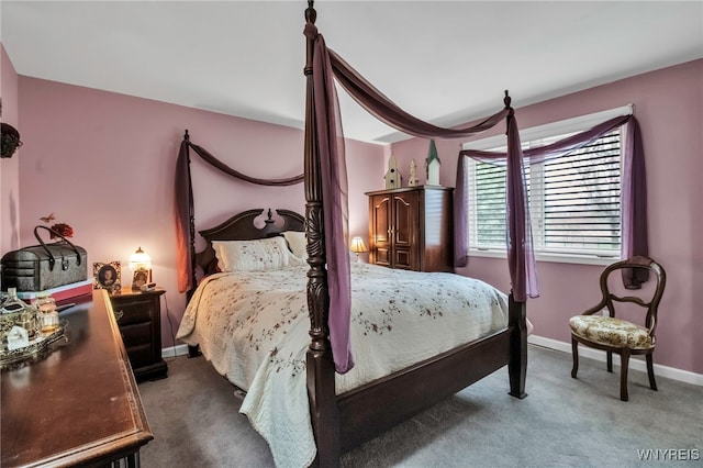 carpeted bedroom with baseboards