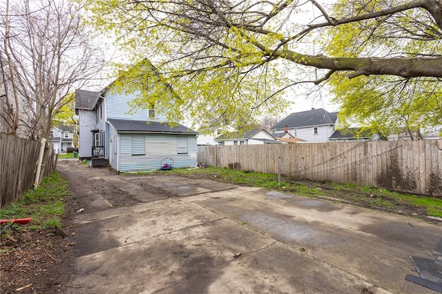 back of house featuring fence and a patio