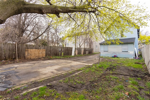 view of side of property featuring fence private yard