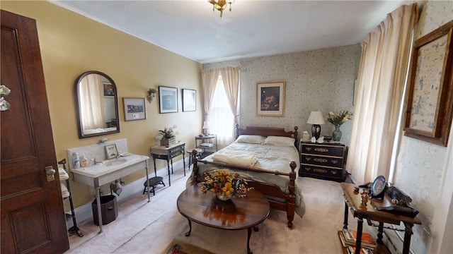 20 S Main St, Sherburne, NY 13460 - bedroom with baseboards, wallpapered walls, and light colored carpet