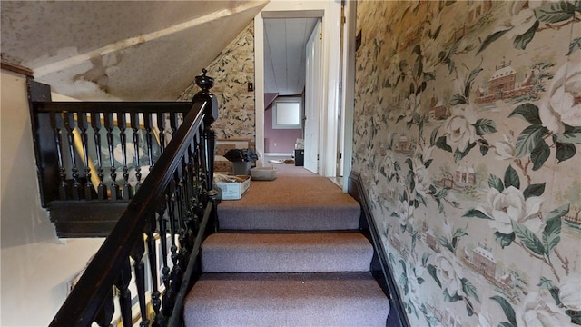20 S Main St, Sherburne, NY 13460 - stairs featuring wallpapered walls, carpet floors, and lofted ceiling