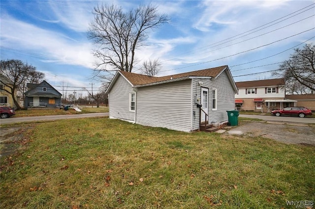 1001 Garden Ave, Niagara Falls, NY 14305 - view of side of home with a yard and entry steps