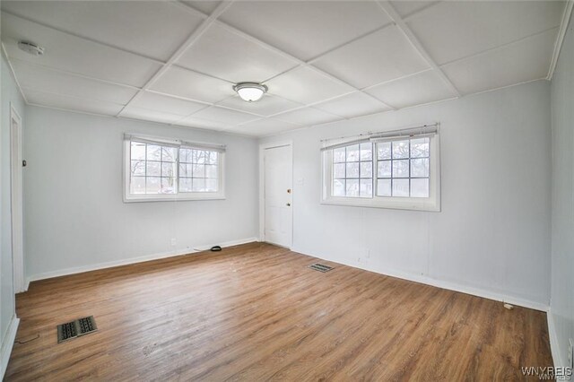 1001 Garden Ave, Niagara Falls, NY 14305 - spare room featuring visible vents, wood finished floors, and baseboards