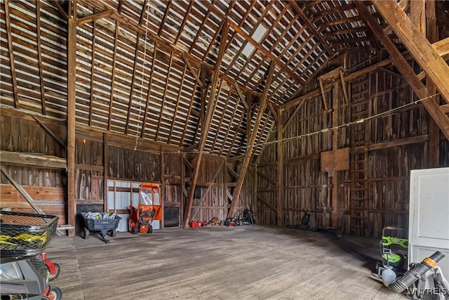 misc room with high vaulted ceiling