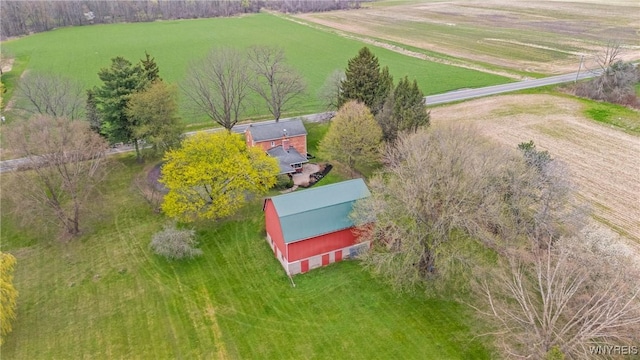 birds eye view of property featuring a rural view