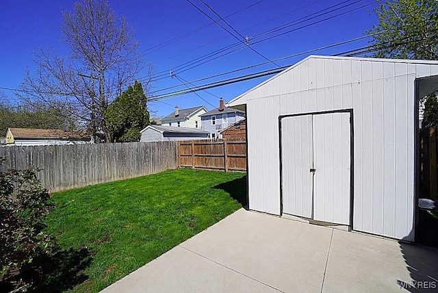 view of shed featuring a fenced backyard