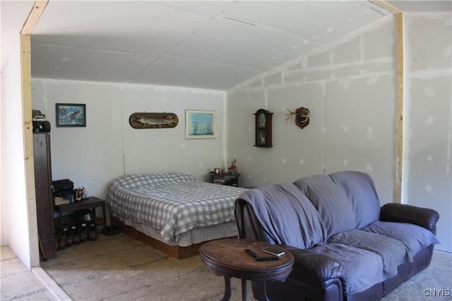 bedroom with lofted ceiling