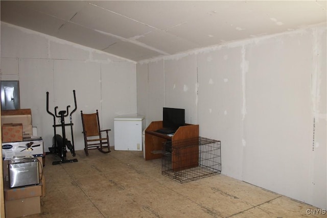 basement with fridge