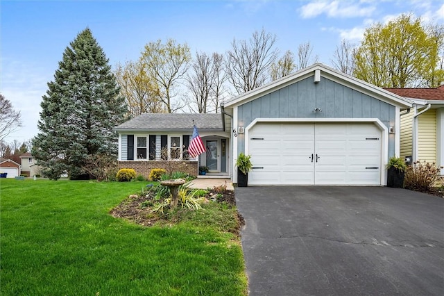 ranch-style house with driveway, a front lawn, board and batten siding, and an attached garage