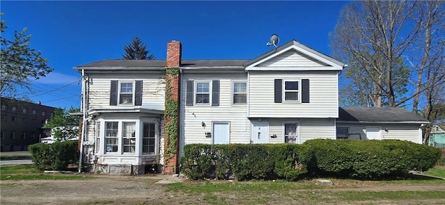 view of front of house with a chimney