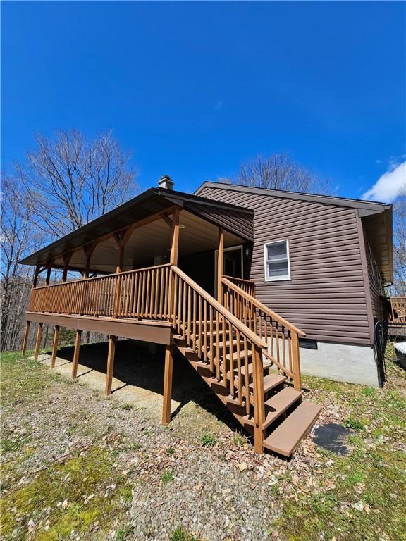 rear view of house with stairway