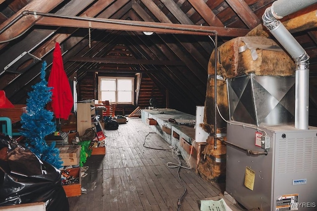 unfinished attic with heating unit
