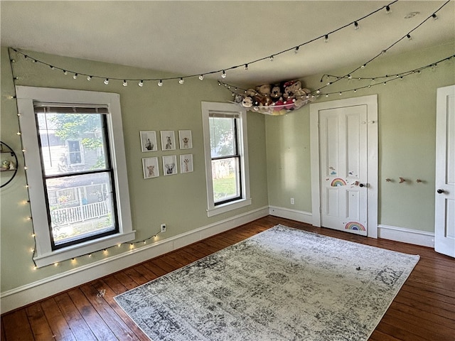 interior space featuring hardwood / wood-style floors and plenty of natural light