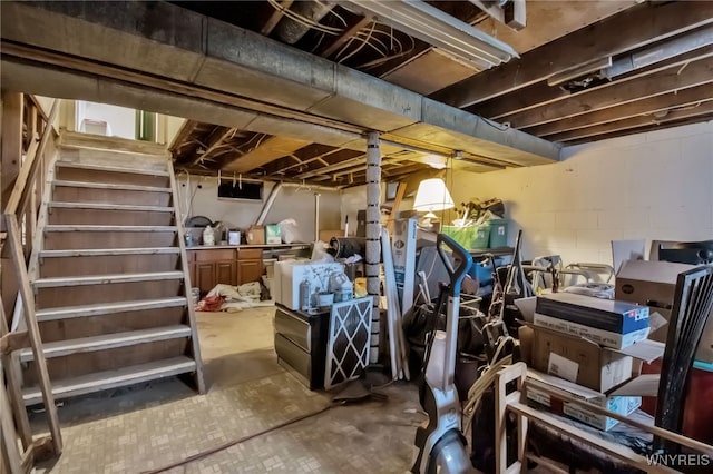 unfinished basement with stairs