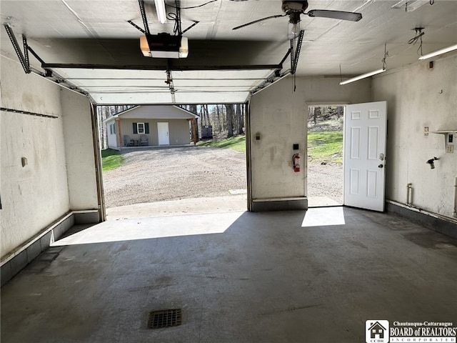 garage featuring a garage door opener