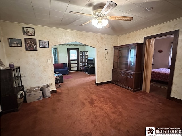 bedroom with baseboards and carpet