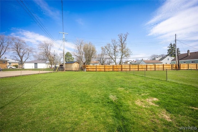 view of yard with fence