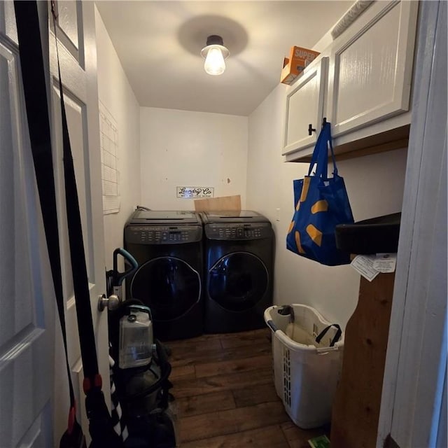 520 Logan St, Elmira-City, NY 14901 - washroom featuring washer and dryer, cabinet space, and dark wood-type flooring
