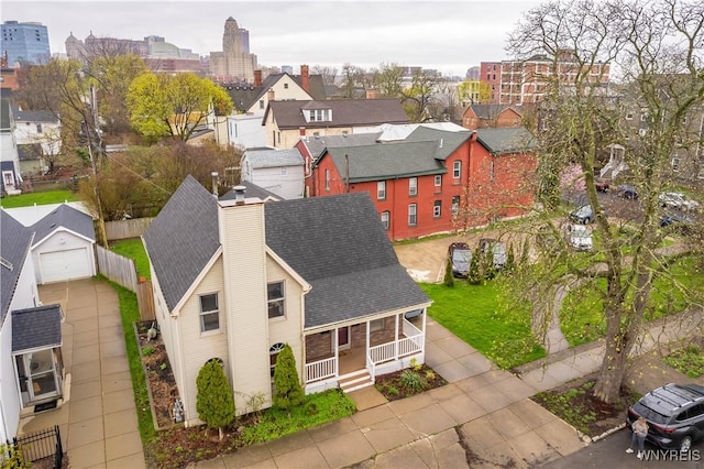 birds eye view of property with a residential view