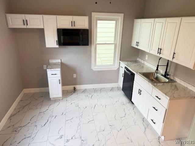kitchen featuring white cabinets, a sink, baseboards, black appliances, and marble finish floor