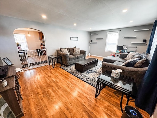 117 Raphael Ave, Salina, NY 13211 - living room with recessed lighting, arched walkways, a wealth of natural light, and wood finished floors