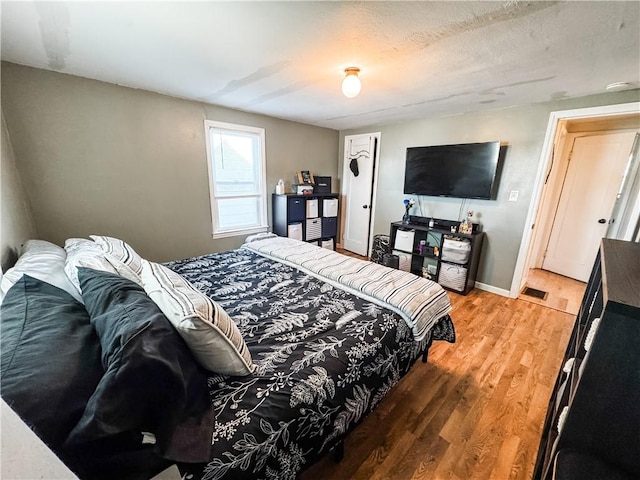 117 Raphael Ave, Salina, NY 13211 - bedroom with light wood finished floors and baseboards