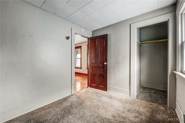 unfurnished bedroom featuring carpet floors