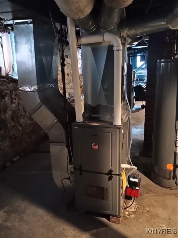 utilities with gas water heater and heating unit