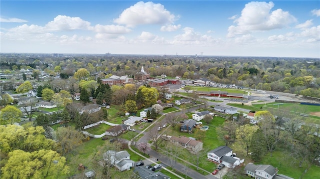 birds eye view of property with a residential view