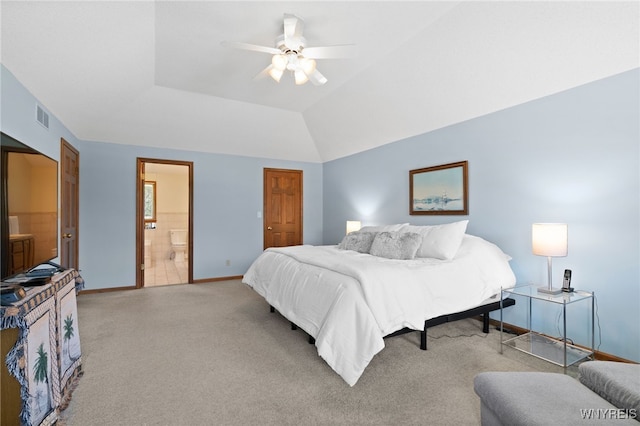 bedroom featuring a ceiling fan, visible vents, baseboards, light carpet, and ensuite bath