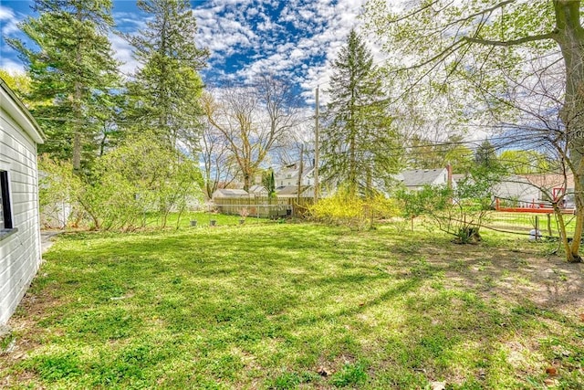 view of yard with fence