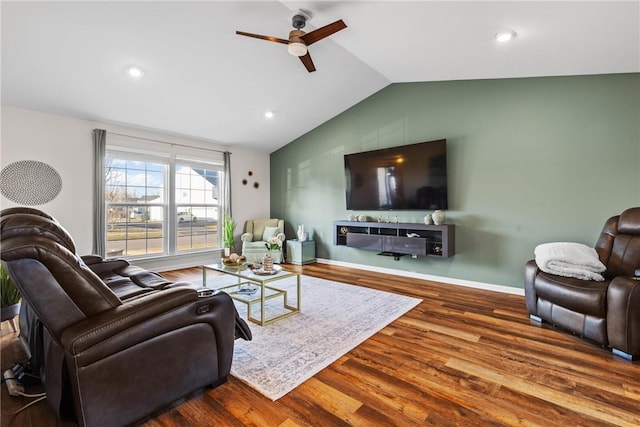 living area featuring ceiling fan, recessed lighting, baseboards, wood finished floors, and lofted ceiling