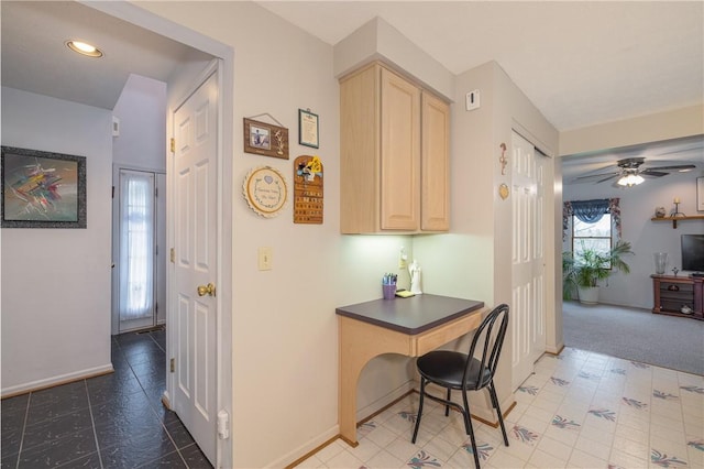 corridor with baseboards and recessed lighting