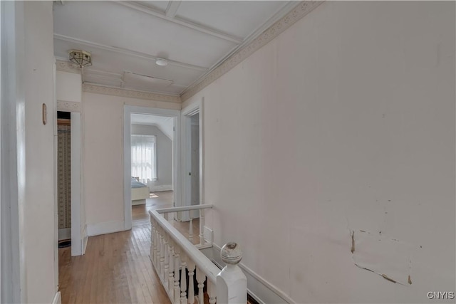 427 S James St, Wilna, NY 13619 - hallway featuring baseboards, light wood finished floors, crown molding, and an upstairs landing