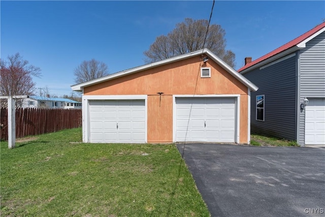 427 S James St, Wilna, NY 13619 - garage with fence