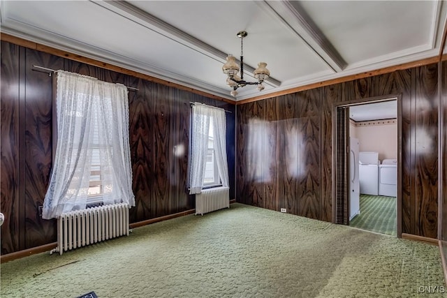 427 S James St, Wilna, NY 13619 - spare room featuring washer and dryer, an inviting chandelier, carpet floors, and radiator