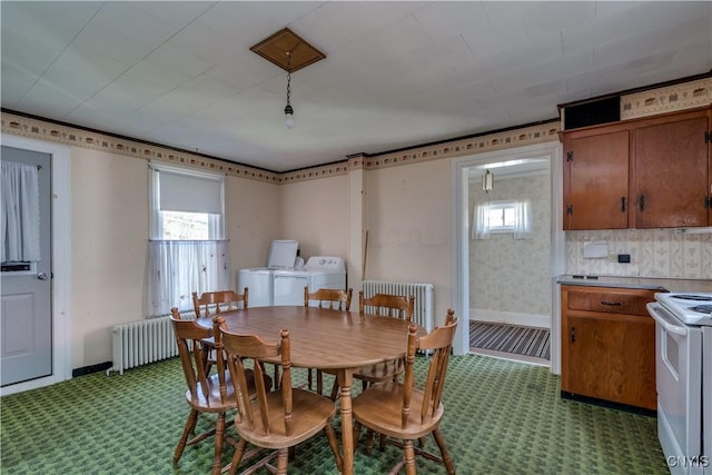 427 S James St, Wilna, NY 13619 - dining area with washing machine and clothes dryer and radiator heating unit